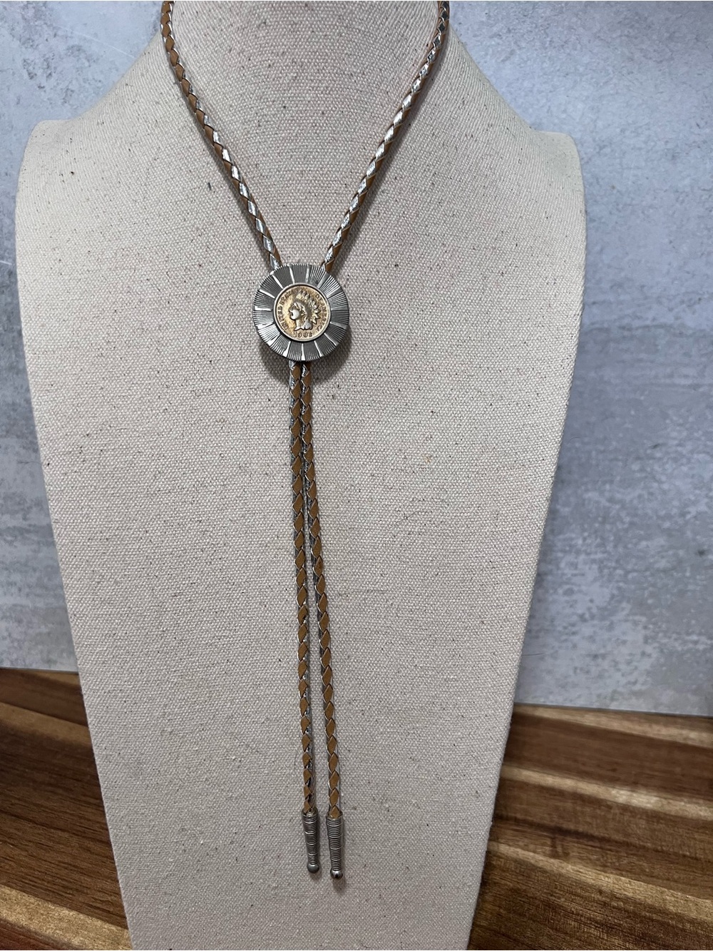 Vintage bolo tie silver-toned sunburst concho inset with Indian head penny